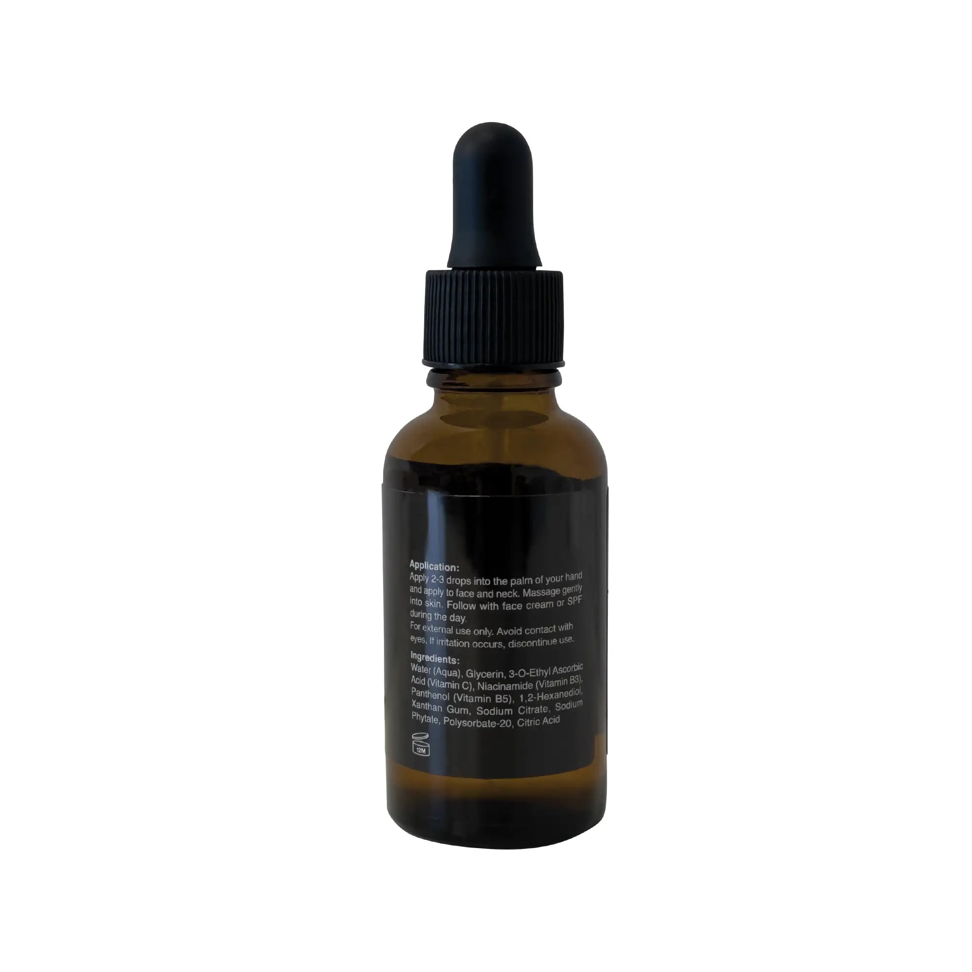 White-labeled niacinamide serum bottle against white background