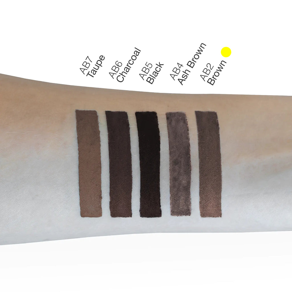 Brown eyebrow pencil swatch demonstrating natural brow color blending on skin