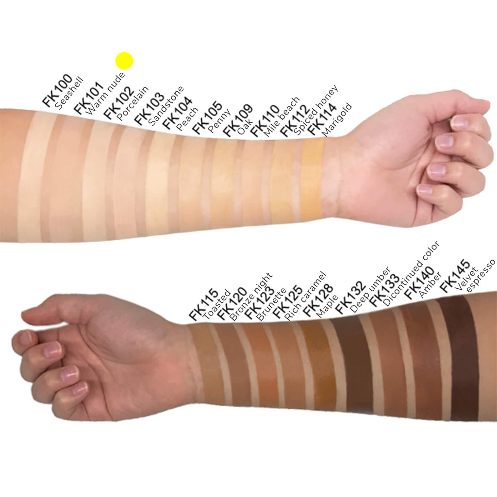 Swatch of warm nude foundation showing natural glow and buildable coverage