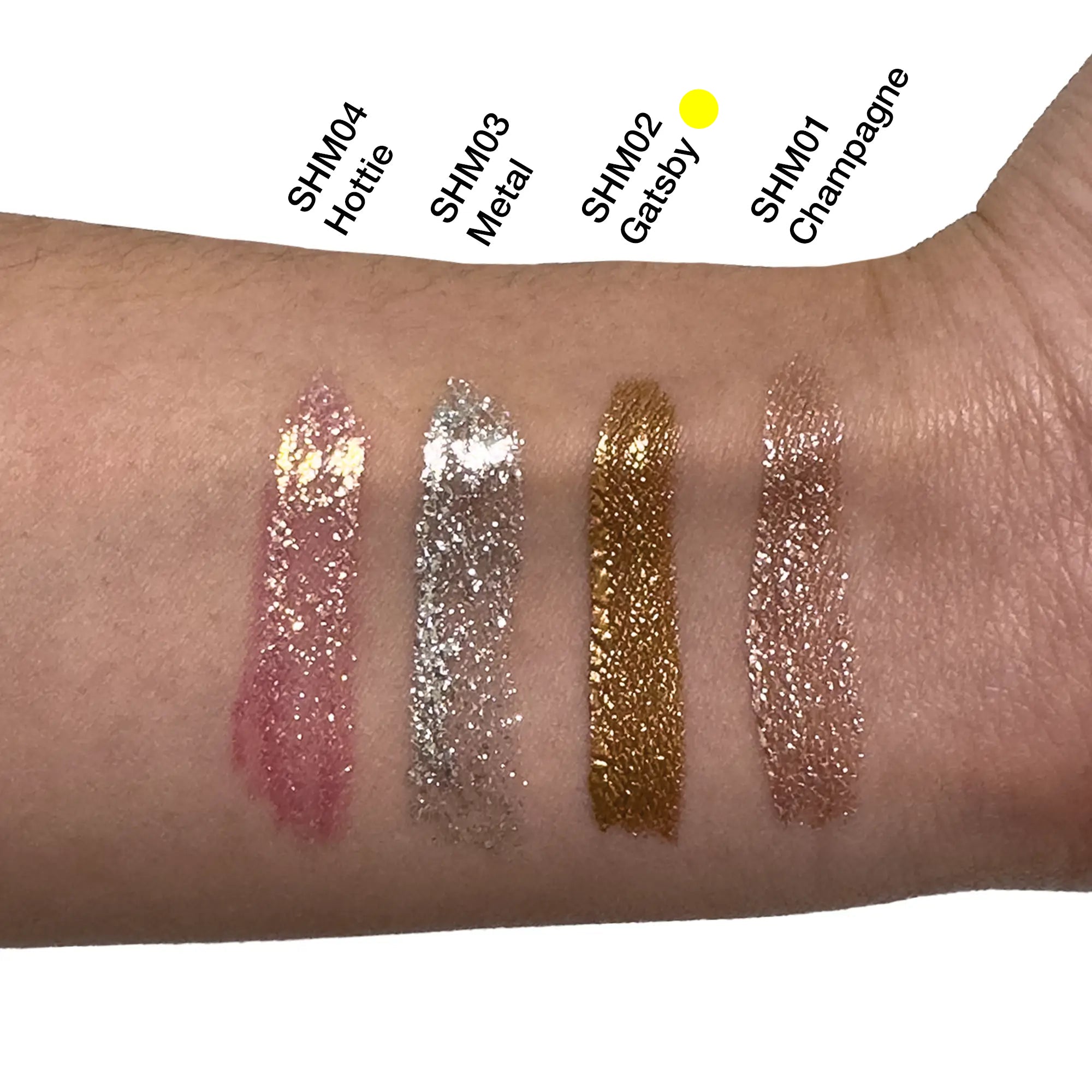 Four iridescent liquid shimmer shades on arm swatch with glossy shine